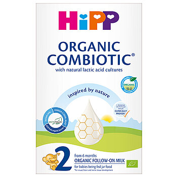 Škatla hrane za dojenčke Hipp Organic Combiotic, zlasti nadaljevalnega mleka za dojenčke, ki se hranijo s hrano iz kozarca, s stilizirano grafiko kapljice z vzorcem satovja in zeleno kljukico, ki označuje rezultat testa.