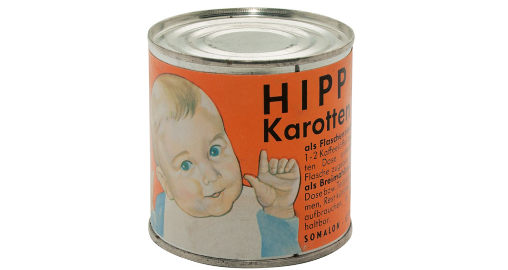 Na pločevinki je upodobljen dojenček z napisom "HIPP Karotten" in "SOMALON".