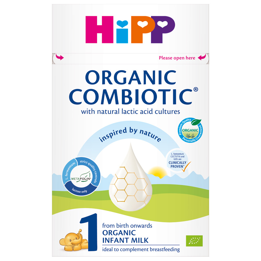 Škatla začetne formule za dojenčke Hipp Organic Combiotic, 1. stopnja, z grafiko kapljice z vzorcem satovja in majhno ilustracijo dojenčka.